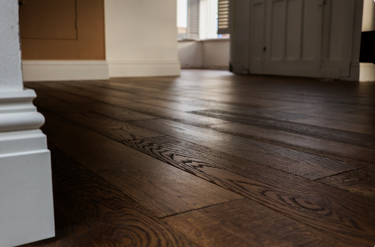 Dark stained wide plank flooring